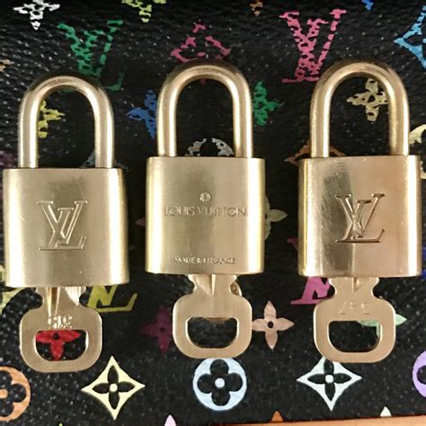 louis vuitton lock and key bag|authentic louis vuitton keychain.